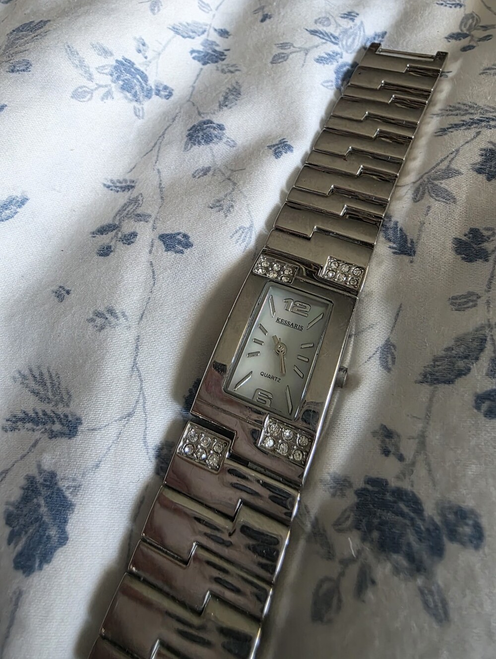 Kessaris brand rectangular women's watch featuring rhinestone accents